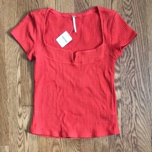 Free people orange/red “notch your girl” short sleeve top size small